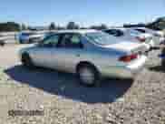 2000 Toyota Camry LE with VIN 4T1BF22K7YU112165, listed as a Copart auction lot 82239315 with 408,519 mi miles and Salvage title. Bid and sale history available at DreamBid. Image 2.