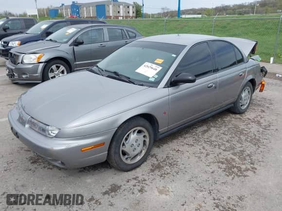 1997 Saturn SL с VIN 1G8ZK527XVZ257477, выставлен на аукционе IAAI как лот 42029648 с пробегом 114 371 миль миль и . История ставок и продаж доступна на DreamBid. Изображение 17.