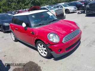2009 MINI Hardtop with VIN WMWMF33529TU75568, listed as a IAAI auction lot 43012391 with 218,591 mi miles and . Bid and sale history available at DreamBid. Image 1.