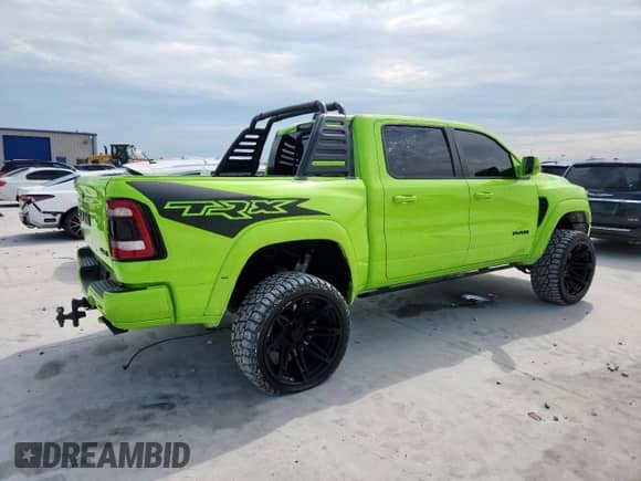 2023 Ram 1500 TRX z VIN 1C6SRFU94PN536609, wystawiony jako Copart lot #86865605 z przebiegiem 24 713 mil mil oraz Czysty tytuł • Clean title. Historia ofert i sprzedaży dostępna na DreamBid. Obrazek 3.