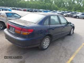2001 Saturn L z VIN 1G8JT54F21Y557142, wystawiony jako IAAI lot #42192882 z przebiegiem Nie podano mil oraz . Historia ofert i sprzedaży dostępna na DreamBid. Obrazek 4.
