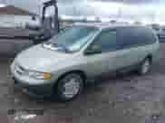 1999 Dodge Caravan SE with VIN 1B4GP44R4XB854348, listed as a IAAI auction lot 41871640 with 169,312 mi miles and . Bid and sale history available at DreamBid. Image 2.