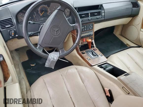 1992 Mercedes-Benz 500 z VIN WDBFA66E2NF039687, wystawiony jako Copart lot #59231955 z przebiegiem 65 224 mil mil oraz Czysty tytuł • Clean title. Historia ofert i sprzedaży dostępna na DreamBid. Obrazek 8.