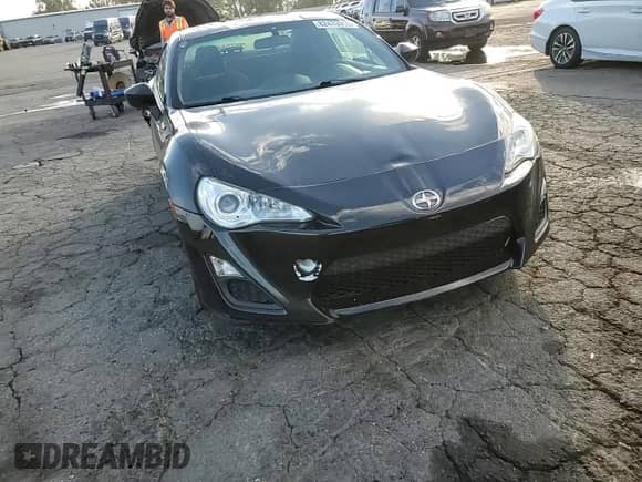 2013 Scion FR-S z VIN JF1ZNAA12D2704495, wystawiony jako Copart lot #82430005 z przebiegiem 130 918 mil mil oraz Szkoda całkowita • Salvage title. Historia ofert i sprzedaży dostępna na DreamBid. Obrazek 13.