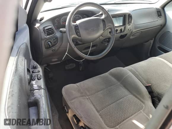 2002 Ford F-150 XL with VIN 1FTRX17LX2KC01615, listed as a Copart auction lot 85391495 with 176,921 mi miles and Salvage title. Bid and sale history available at DreamBid. Image 8.