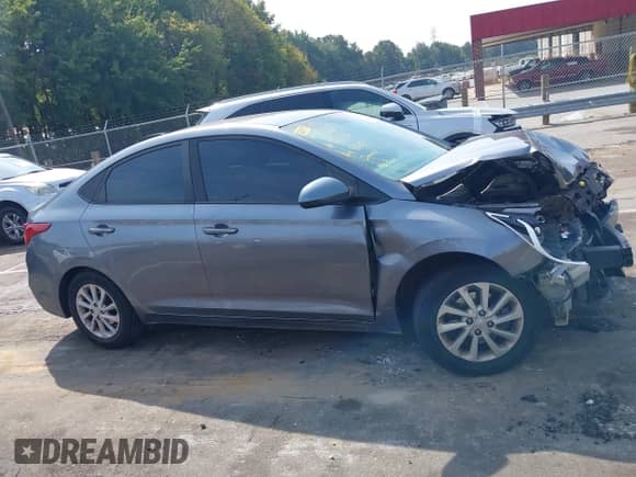 2018 Hyundai Accent SE z VIN 3KPC24A33JE024857, wystawiony jako IAAI lot #43279253 z przebiegiem 131 782 mil mil oraz . Historia ofert i sprzedaży dostępna na DreamBid. Obrazek 14.