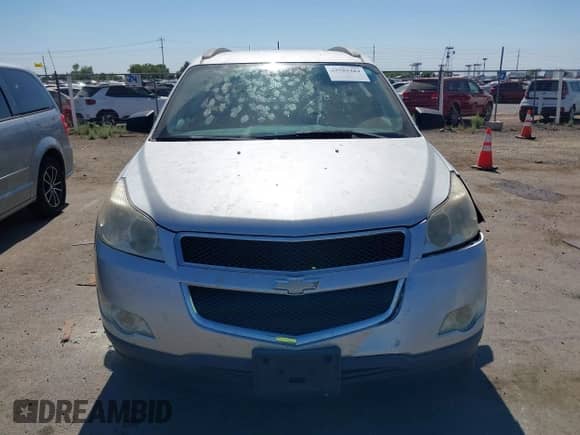 2010 Chevrolet Traverse LS z VIN 1GNLVEED7AS147646, wystawiony jako IAAI lot #42582484 z przebiegiem 58 809 mil mil oraz . Historia ofert i sprzedaży dostępna na DreamBid. Obrazek 12.
