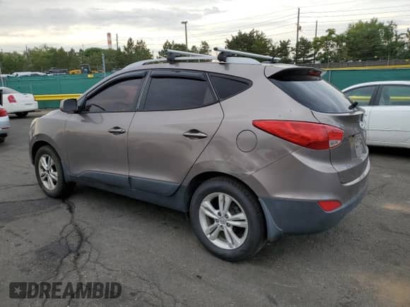 2011 Hyundai Tucson GLS with VIN KM8JU3AC7BU119240, listed as a Copart auction lot 68375445 with 188,541 mi miles and Clean title. Bid and sale history available at DreamBid. Image 2.