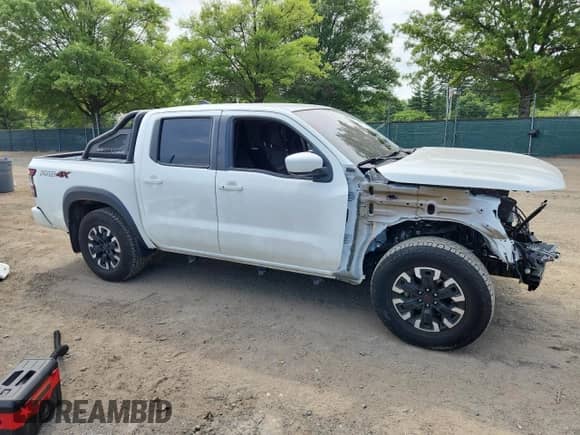 2023 Nissan Frontier S with VIN 1N6ED1EK1PN615029, listed as a Copart auction lot 60319245 with 38,876 mi miles and Salvage title. Bid and sale history available at DreamBid. Image 4.