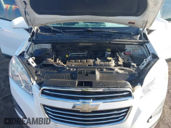 2016 Chevrolet Trax LS z VIN KL7CJNSB4GB595940, wystawiony jako IAAI lot #42770245 z przebiegiem 198 253 mil mil oraz . Historia ofert i sprzedaży dostępna na DreamBid. Obrazek 10.