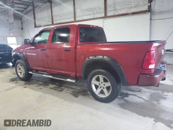 2012 Ram 1500 Express z VIN 1C6RD7KT1CS184196, wystawiony jako Copart lot #85540455 z przebiegiem 146 259 mil mil oraz Czysty tytuł • Clean title. Historia ofert i sprzedaży dostępna na DreamBid. Obrazek 2.