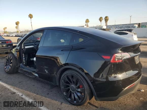 2022 Tesla Model Y Performance with VIN 7SAYGDEF9NF393852, listed as a Copart auction lot 63141094 with 26,972 mi miles and Salvage title. Bid and sale history available at DreamBid. Image 2.