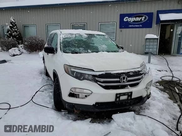 2018 Honda Pilot LX с VIN 5FNYF5H13JB005594, выставлен на аукционе Copart как лот 87054304 с пробегом Не указан миль и Списание • Salvage title. История ставок и продаж доступна на DreamBid. Изображение 14.