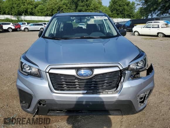 2020 Subaru Forester z VIN JF2SKADC2LH483690, wystawiony jako Copart lot #65128545 z przebiegiem 99 777 mil mil oraz Szkoda całkowita • Salvage title. Historia ofert i sprzedaży dostępna na DreamBid. Obrazek 5.