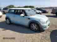 2011 MINI Hardtop with VIN WMWSU3C52BT253034, listed as a Copart auction lot 90109305 with 50,636 mi miles and Salvage title. Bid and sale history available at DreamBid. Image 4.