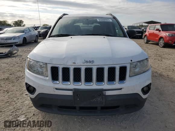 2012 Jeep Compass Sport z VIN 1C4NJCBB4CD657156, wystawiony jako Copart lot #85888905 z przebiegiem 222 460 mil mil oraz Szkoda całkowita • Salvage title. Historia ofert i sprzedaży dostępna na DreamBid. Obrazek 5.