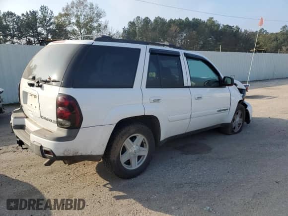 2002 Chevrolet TrailBlazer LTZ with VIN 1GNDS13S522213636, listed as a Copart auction lot 82784704 with Not provided miles and Salvage title. Bid and sale history available at DreamBid. Image 3.