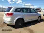 2014 Dodge Journey American Value with VIN 3C4PDCAB3ET140610, listed as a Copart auction lot 86189675 with 124,630 mi miles and Clean title. Bid and sale history available at DreamBid. Image 3.