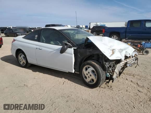 2002 Saturn SC with VIN 1G8ZY12772Z164242, listed as a Copart auction lot 46911695 with 216,124 mi miles and Salvage title. Bid and sale history available at DreamBid. Image 4.