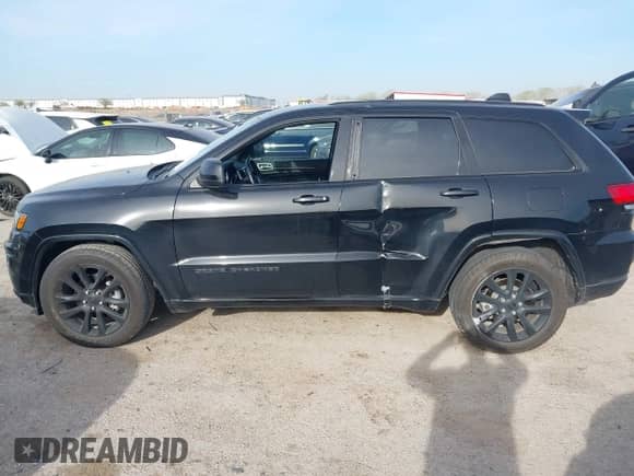 2018 Jeep Grand Cherokee Laredo E with VIN 1C4RJEAG4JC311699, listed as a IAAI auction lot 41876920 with 42,584 mi miles and . Bid and sale history available at DreamBid. Image 14.