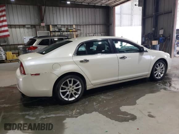 2011 Chevrolet Malibu LTZ with VIN 1G1ZE5E78BF399390, listed as a Copart auction lot 69113985 with 217,289 mi miles and Salvage title. Bid and sale history available at DreamBid. Image 3.