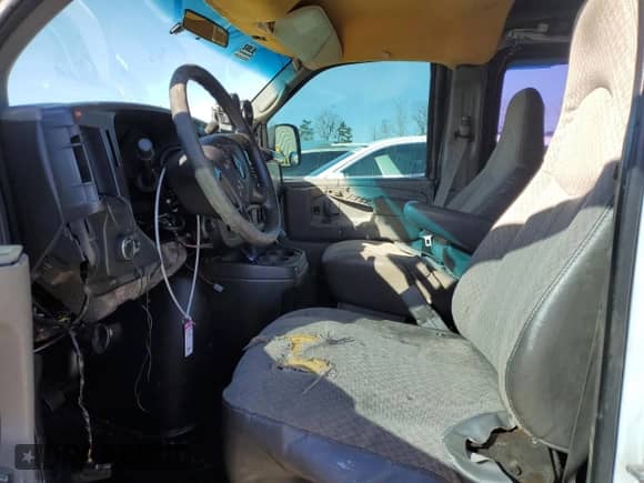 2010 Chevrolet Express Cargo with VIN 1GCUGADX1A1106446, listed as a Copart auction lot 88542695 with 184,062 mi miles and Salvage title. Bid and sale history available at DreamBid. Image 7.
