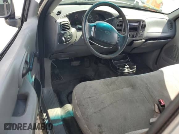 2000 Ford F-150 XL z VIN 1FTRX17W3YKB40014, wystawiony jako Copart lot #63325265 z przebiegiem 314 097 mil mil oraz Czysty tytuł • Clean title. Historia ofert i sprzedaży dostępna na DreamBid. Obrazek 8.