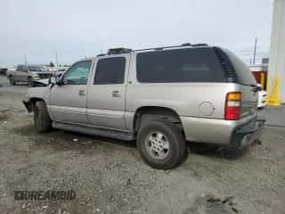 2003 Chevrolet Suburban LT z VIN 1GNFK16Z93J247930, wystawiony jako Copart lot #77023324 z przebiegiem Nie podano mil oraz Szkoda całkowita • Salvage title. Historia ofert i sprzedaży dostępna na DreamBid. Obrazek 2.