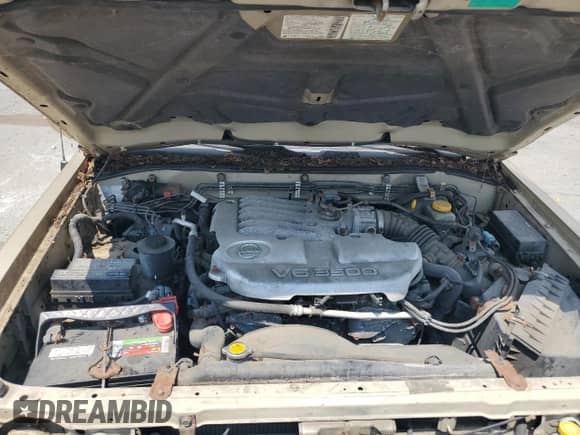 2004 Nissan Pathfinder SE z VIN JN8DR09Y44W913755, wystawiony jako Copart lot #69020225 z przebiegiem 188 724 mil mil oraz Nie do naprawy • Non repairable. Historia ofert i sprzedaży dostępna na DreamBid. Obrazek 12.