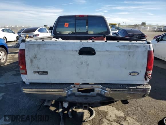 1997 Ford F-150 XL z VIN 1FTEX17L9VKB65855, wystawiony jako Copart lot #87410414 z przebiegiem 198 005 mil mil oraz Szkoda całkowita • Salvage title. Historia ofert i sprzedaży dostępna na DreamBid. Obrazek 6.