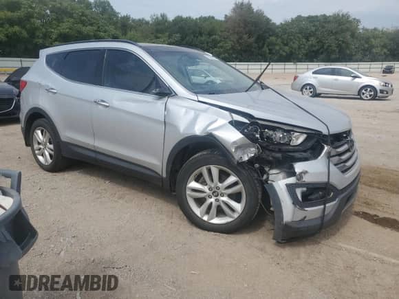 2014 Hyundai Santa Fe with VIN 5XYZWDLA7EG166440, listed as a Copart auction lot 72062825 with 187,966 mi miles and Salvage title. Bid and sale history available at DreamBid. Image 4.