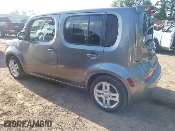 2013 Nissan Cube S with VIN JN8AZ2KR0DT304309, listed as a IAAI auction lot 41997145 with 130,446 mi miles and . Bid and sale history available at DreamBid. Image 3.