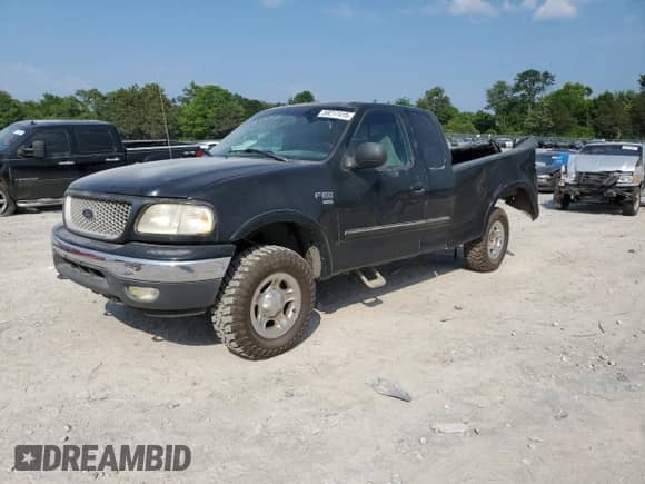 1999 Ford F-150 z VIN 1FTRX18W1XNA90998, wystawiony jako Copart lot #59217415 z przebiegiem Nie podano mil oraz Szkoda całkowita • Salvage title. Historia ofert i sprzedaży dostępna na DreamBid. Obrazek 1.