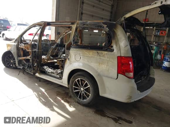 2018 Dodge Grand Caravan SE with VIN 2C4RDGBG2JR201064, listed as a IAAI auction lot 42108141 with Not provided miles and . Bid and sale history available at DreamBid. Image 3.