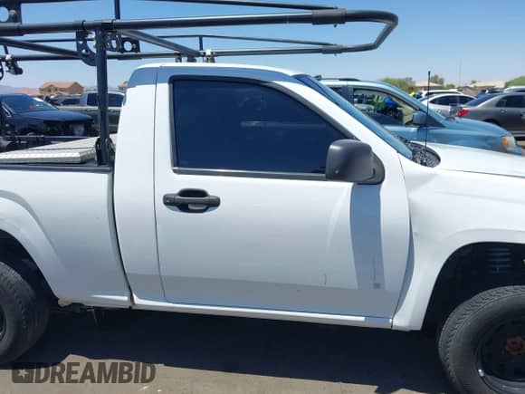 2007 Chevrolet Colorado LS z VIN 1GCCS149178148594, wystawiony jako IAAI lot #42324782 z przebiegiem 162 967 mil mil oraz . Historia ofert i sprzedaży dostępna na DreamBid. Obrazek 14.