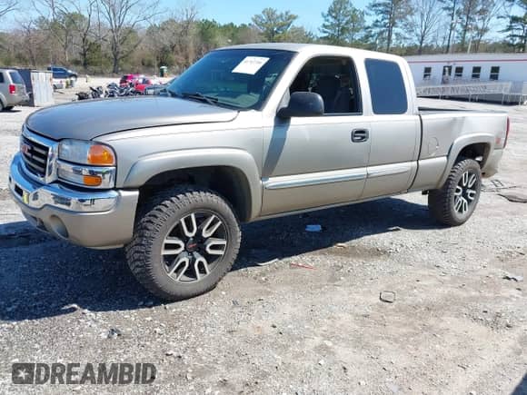 2003 GMC Sierra 1500 SLT z VIN 1GTEK19TX3E107129, wystawiony jako IAAI lot #41747356 z przebiegiem 267 536 mil mil oraz . Historia ofert i sprzedaży dostępna na DreamBid. Obrazek 2.
