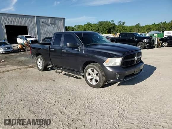 2014 Ram 1500 Tradesman z VIN 1C6RR6FT9ES455627, wystawiony jako Copart lot #67121715 z przebiegiem 194 161 mil mil oraz Szkoda całkowita • Salvage title. Historia ofert i sprzedaży dostępna na DreamBid. Obrazek 13.