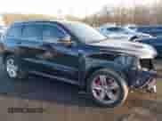 2015 Jeep Grand Cherokee SRT with VIN 1C4RJFDJ6FC744087, listed as a IAAI auction lot 41500653 with 130,530 mi miles and . Bid and sale history available at DreamBid. Image 19.