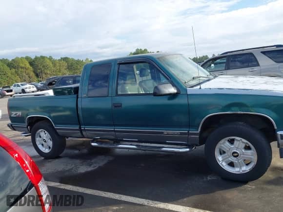 1996 Chevrolet Silverado 1500 with VIN 2GCEK19R3T1130144, listed as a IAAI auction lot 43324635 with 233,545 mi miles and . Bid and sale history available at DreamBid. Image 13.