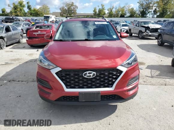 2021 Hyundai Tucson Value with VIN KM8J33A42MU406502, listed as a Copart auction lot 83878815 with 126,612 mi miles and Salvage title. Bid and sale history available at DreamBid. Image 5.