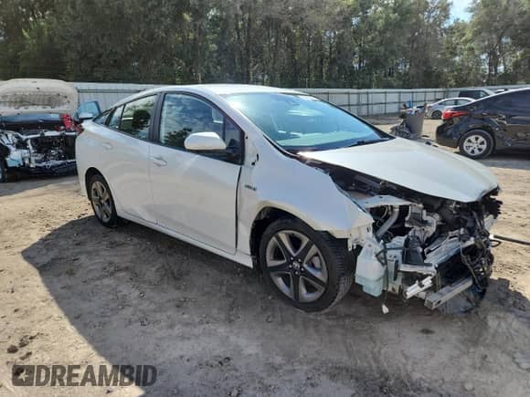 2020 Toyota Prius L Eco с VIN JTDKARFU6L3113636, выставлен на аукционе Copart как лот 84175765 с пробегом 157 861 миль миль и На запчасти • Non repairable. История ставок и продаж доступна на DreamBid. Изображение 4.