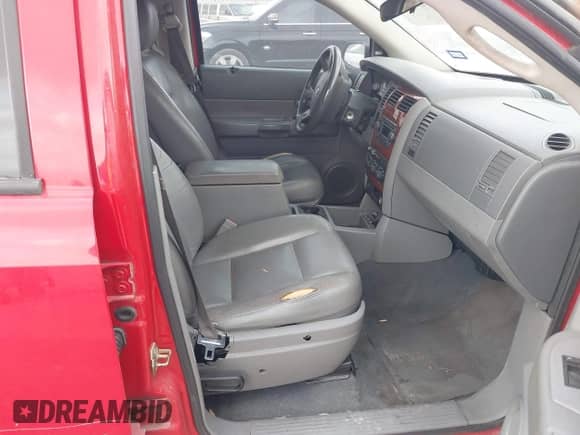 2004 Dodge Durango SLT z VIN 1D4HD48D54F175355, wystawiony jako IAAI lot #41929379 z przebiegiem 257 620 mil mil oraz . Historia ofert i sprzedaży dostępna na DreamBid. Obrazek 5.