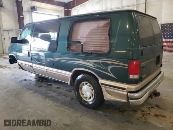2001 Ford Econoline Cargo Recreational with VIN 1FDRE14L71HA69804, listed as a Copart auction lot 64798505 with 150,447 mi miles and Salvage title. Bid and sale history available at DreamBid. Image 2.