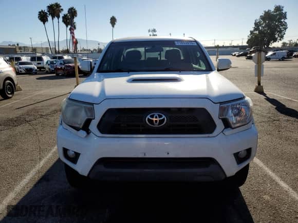2014 Toyota Tacoma PreRunner with VIN 3TMKU4HN3EM040744, listed as a Copart auction lot 71853915 with 140,505 mi miles and Salvage title. Bid and sale history available at DreamBid. Image 5.