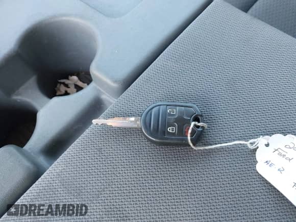 2014 Ford F-150 FX4 with VIN 1FTFW1ET8EFB87719, listed as a IAAI auction lot 43215688 with 165,880 mi miles and . Bid and sale history available at DreamBid. Image 11.