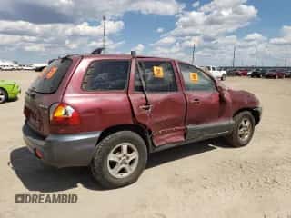 2003 Hyundai Santa Fe GLS с VIN KM8SC13D23U448494, выставлен на аукционе Copart как лот 62625224 с пробегом 7 094 миль миль и Списание • Salvage title. История ставок и продаж доступна на DreamBid. Изображение 3.