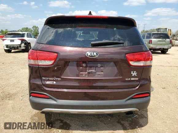 2016 Kia Sorento EX with VIN 5XYPHDA16GG003608, listed as a Copart auction lot 68520385 with 116,712 mi miles and Salvage title. Bid and sale history available at DreamBid. Image 6.