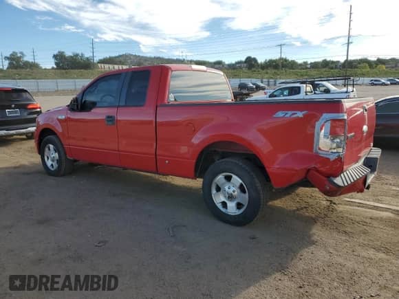 2007 Ford F-150 STX with VIN 1FTRX12W87KD46533, listed as a Copart auction lot 84247045 with 125,004 mi miles and Salvage title. Bid and sale history available at DreamBid. Image 2.