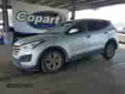2016 Hyundai Santa Fe with VIN 5XYZT3LB9GG370476, listed as a Copart auction lot 68878545 with 67,676 mi miles and Salvage title. Bid and sale history available at DreamBid. Image 1.