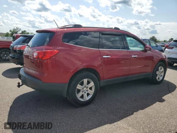 2012 Chevrolet Traverse 2LT z VIN 1GNKVJED7CJ237912, wystawiony jako Copart lot #59508255 z przebiegiem 124 031 mil mil oraz Szkoda całkowita • Salvage title. Historia ofert i sprzedaży dostępna na DreamBid. Obrazek 3.